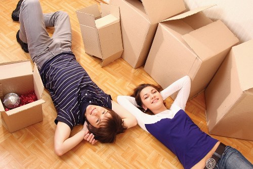 Expert moving professionals handling delicate items